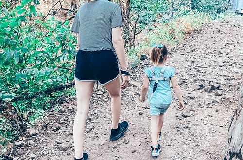 mom and daughter hiking